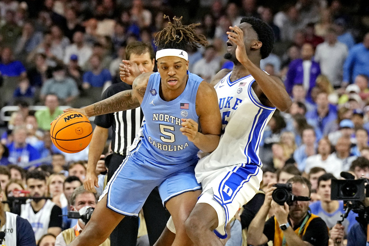 Apr 2, 2022; New Orleans, LA, USA; North Carolina Tar Heels forward Armando Bacot (5) drives to the basket against Duke Blue Devils forward Paolo Banchero (5) in the 2022 NCAA men's basketball tournament Final Four semifinals at Caesars Superdome. Mandatory Credit: Robert Deutsch-USA TODAY Sports